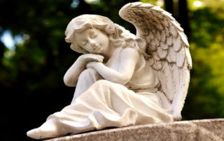 angel sculpture in cemetery