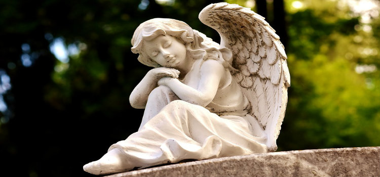 angel sculpture in cemetery