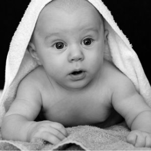 baby with towel on head