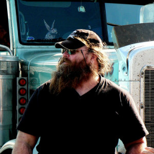 bearded truck driver outside
