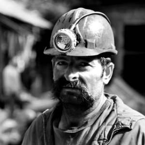 black and white portrait of a miner
