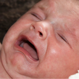 closeup crying newborn