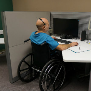 disabled man working at call center