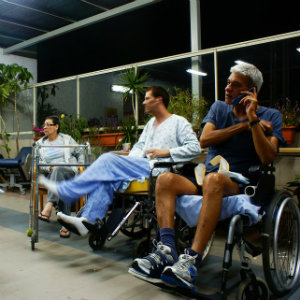 disabled people waiting in wheelchairs