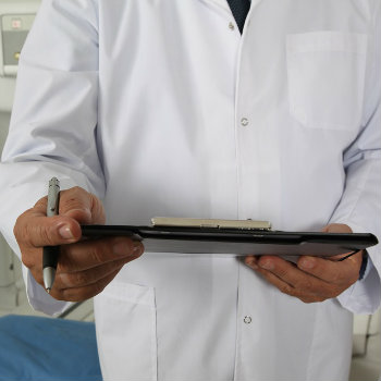 doctor holding clipboard