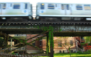 elevated train over grass