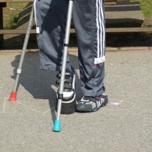 handicapped with crutches