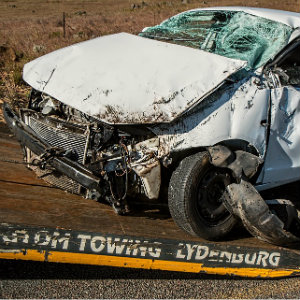 head-on collision damage white car
