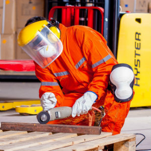 industrial laborer working from knee