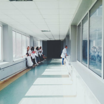 nurses in hospital hallway