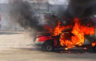 red car on fire