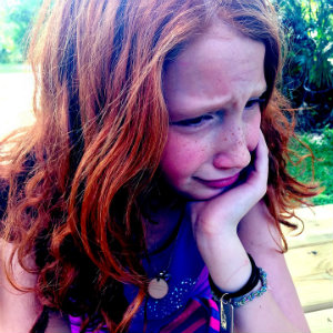 sad redhaired girl