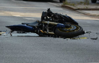 totaled motorcycle in street