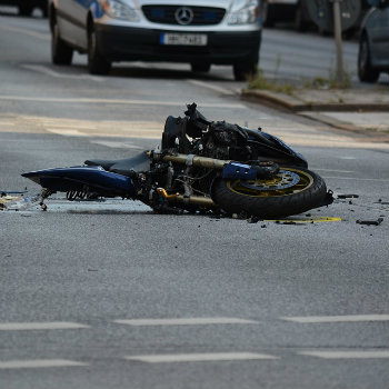 totaled motorcycle in street